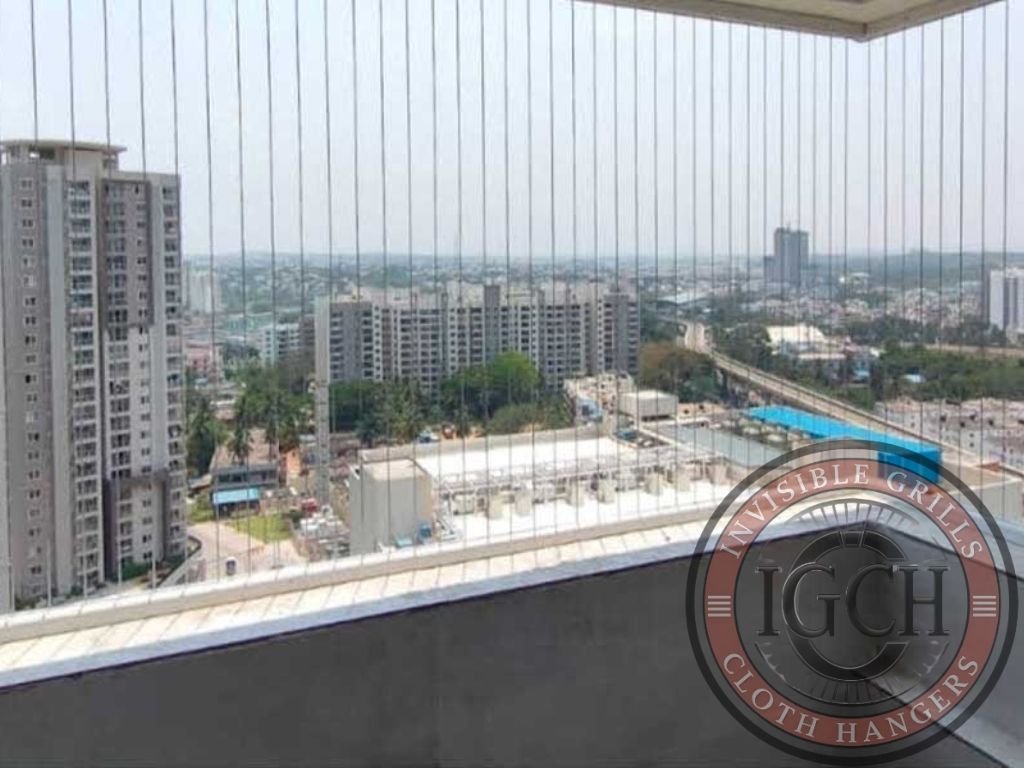 Apartment balcony protected with invisible grills without disturbing view in Uppal