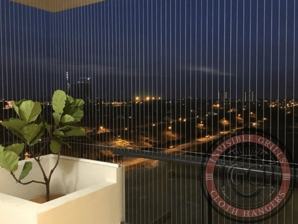 Balcony fitted with invisible safety grills for children’s protection in Adyar