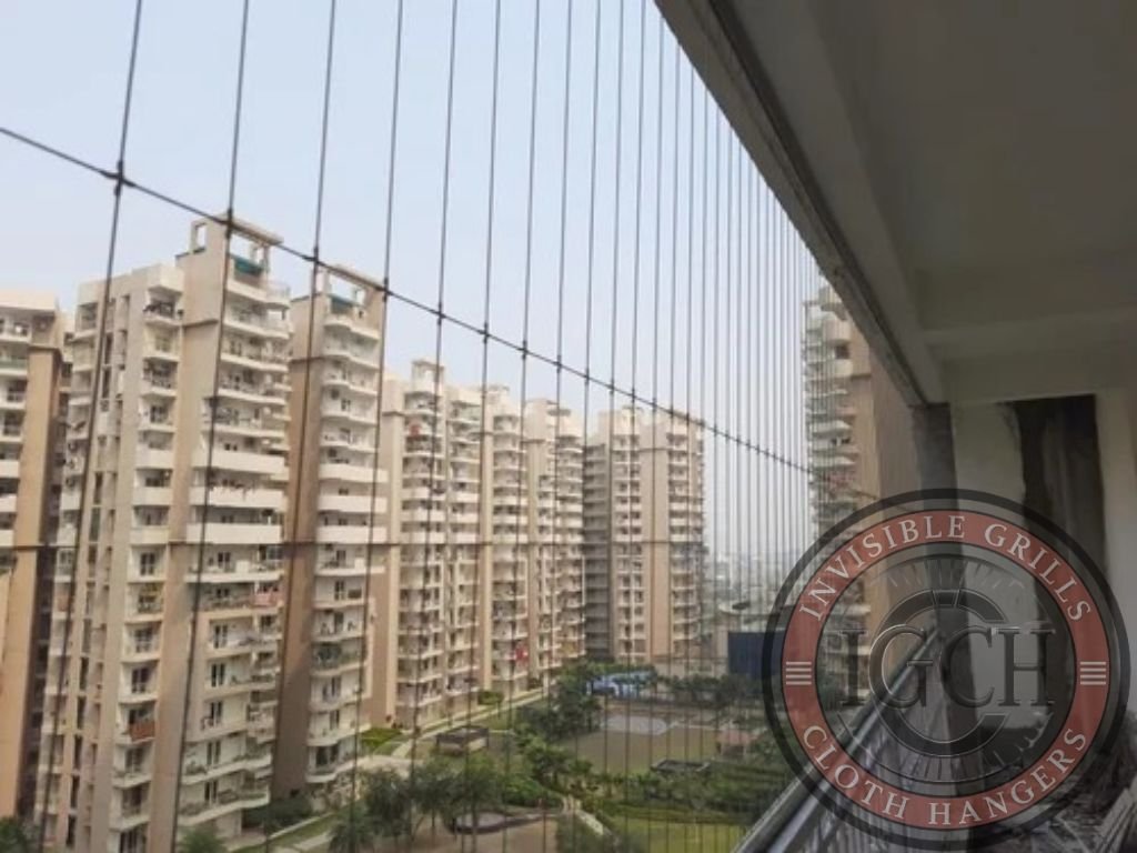 Transparent invisible grills keeping pigeons away from balcony space in Chennai