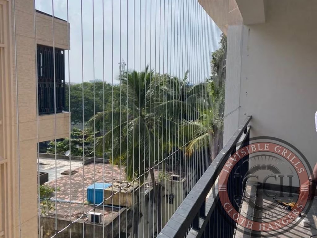 Apartment balcony secured with invisible grills without blocking outside view LB Nagar