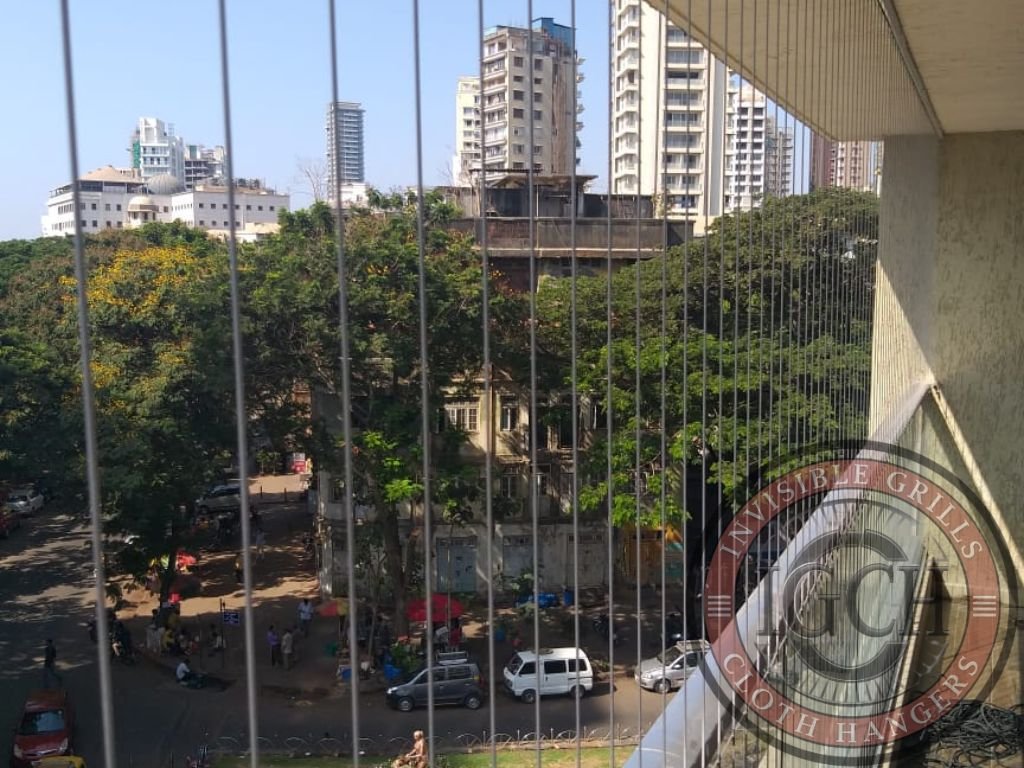 Modern invisible grills and cloth hanger in Kukatpally provide safety with clear view